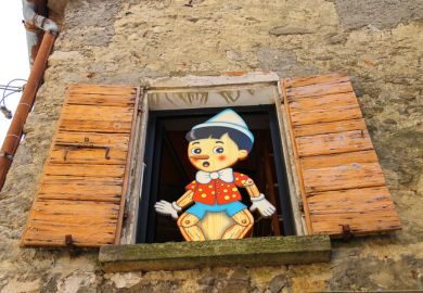 Pinocchio in the window building store of wooden toys in San Marino 